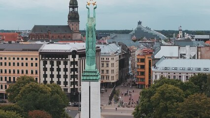 Wall Mural - Beautiful aerial view of Riga city - the capital of Latvia. Statue of liberty Milda - the symbol of freedom of Latvia.