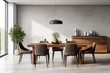 A trendy dining room interior is adorned with a wooden family table, contemporary chairs, and garnished with a plate of nuts, as well as salt and pepper shakers. The space boasts a concrete floor and