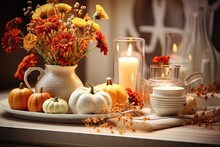 An Arrangement Of Flowers In A Vase, A Large Pumpkin, And Lit Candles Are Displayed On A Tray. The Backdrop Features A Scandinavian Style White Kitchen Interior. The Overall Theme Portrays The Feeling