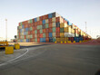 © Connect Images - Stacks of multi coloured shipping containers in docks, Felixstowe, England.
