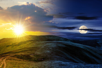 Wall Mural - mountain landscape with sun and moon at twilight. travers path through hill side to the mountain top