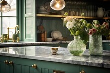 The Marble Countertop Is Clean And Free Of Any Objects, The Vintage Green Kitchen Furniture Is Adorned With Numerous Flowers And A Bowl Filled With Strawberries, And There Are Two White Pendant Lights