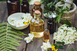 Alternative health care concept, fresh organic herbal plant, floral ingredients for therapy and cosmetics. Essential oil, flower extract. Homemade production, naturopathic treatment, skin, body care