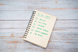 © ADDICTIVE STOCK - Notebook with to do list text placed on wooden table