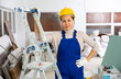 © JackF - Portrait of smiling Asian woman engineer standing in construction site.
