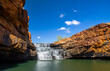 Beautiful waterfall inviting for a refreshing swim at Bell Gorge, in the remote Kimberley region of Western Australia