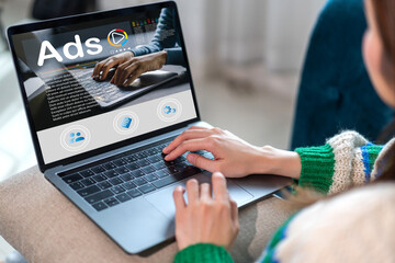 Human use laptop with advertising branding, online content, freelance, sale, working online, content creator, marketing, Ads, digital marketing, branding, E-commerce, blog online on computer at home