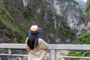 Wall Mural - Woman look at the scenery in Hualien taroko Gorge at Taiwan