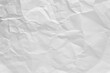 White crumpled paper texture background, clean white wrinkled paper, top view.	