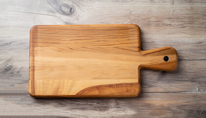 Wall Mural - Wooden cutting board on kitchen table. Flat lay with copy space