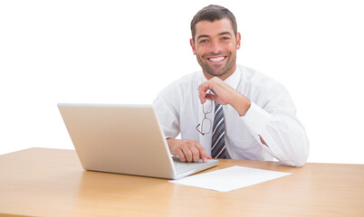 Wall Mural - Digital png photo of caucasian businessman using laptop on transparent background