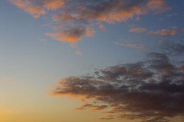 Wall Mural - beautiful warm sunrise sky with clouds.