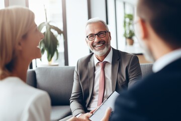 Wall Mural - Smiling laughing colleagues businessmen businesswomen meeting discuss friendly dialogue cooperation strategy brainstorm planning business diversity talking working together partnership communication