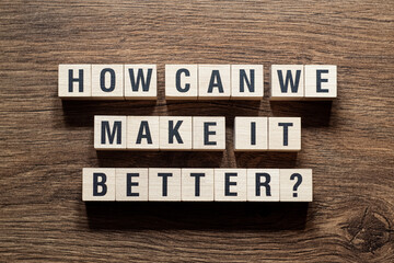 How can we make it better - word concept on building blocks, text