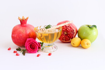 Rosh hashanah (jewish New Year holiday) concept. Traditional symbols over white background