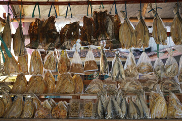 Wall Mural - Salted fish, such as kippered herring or dried and salted cod, is fish cured with dry salt and thus preserved for later eating. Drying or salting, either with dry salt or with brine.