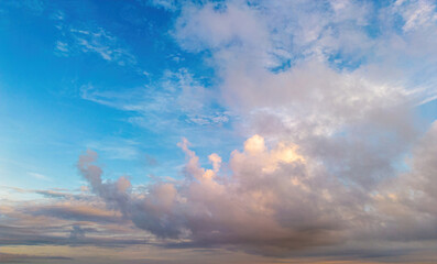 Wall Mural - Horizon panorama and dramatic twilight sky and cloud sunset background. Natural sky background texture, beautiful color. Dark clouds, big storm and rain.