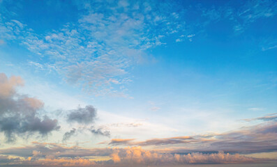 Wall Mural - Horizon panorama and dramatic twilight sky and cloud sunset background. Natural sky background texture, beautiful color. Dark clouds, big storm and rain.