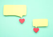 © Pixel-Shot - Paper hearts with blank speech bubbles on turquoise background