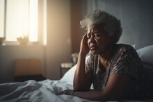 Senior Woman Having A Headache And Feeling Sick In The Bedroom At Home