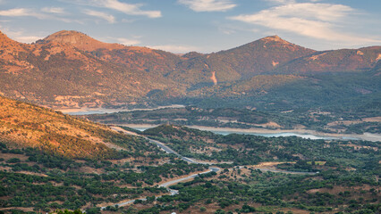 Wall Mural - Tepekoy dam lake and rural landscape from Tepeköy (Agridia) village area of Gökçeada (Imbros) Turkey on a sunny summer day. Canakkale, Turkey. Aerial view