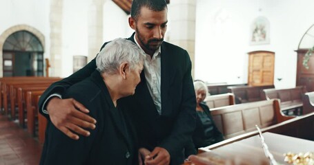 Wall Mural - Funeral, coffin and man hug mother in church for goodbye, mourning and grief in memorial service. Depression, sad family and people embrace by casket in chapel for greeting, loss and burial for death