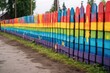 freshly painted wooden fence with vibrant colors