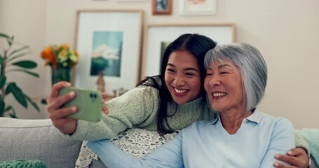 Sticker - Selfie, daughter and a senior woman with a smile for a memory, video call or bonding in a house. Happy, hug and a girl taking a photo with an elderly Asian mom in the living room of a nursing home