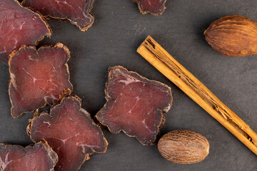 dried red beef meat on the kitchen table