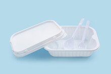 Plastic Food Boxes With Spoon And Fork On Blue Background.