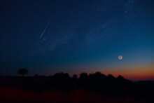 Crescent Moon, Falling Star, Planet Conjunction And Landscape Scenery Silhouettes.
