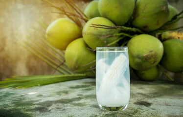 Wall Mural - coconut juice with young coconut. Fresh coconut water, young coconut drink .