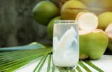Fototapeta Zwierzęta - coconut juice with young coconut. Fresh coconut water, young coconut drink .
