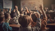 © AspctStyle - Back view of group of school children all raising their hands in the air to answer