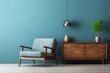 © 2rogan - Living room interior with blue wall, wood floor, and armchair on wood cabinet, 3D render.