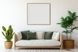 © 2rogan - illustration of a square frame mockup in an interior setting with a gray sofa, cushions, green plaid, snake plant in a wicker basket, and an empty white wall background.