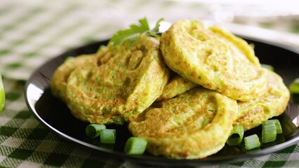 Wall Mural - Fried squash green pancakes in a plate.