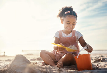 Wall Mural - Sun flare, beach and happy girl with sand, toys and vacation with happiness, playing and cheerful. Kid, shore and female child with fun, getaway trip and adventure with seaside holiday or development