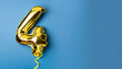 © Uuganbayar - Banner with number 4 golden balloon with copy space. Four years anniversary celebration concept on a blue background.