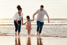 Family, Running And Ocean, Beach And Sunset, Happiness And Fun Together With Games And Bonding On Vacation. Travel, Adventure And Playful, Parents And Child, Happy People In Nature And Holding Hands