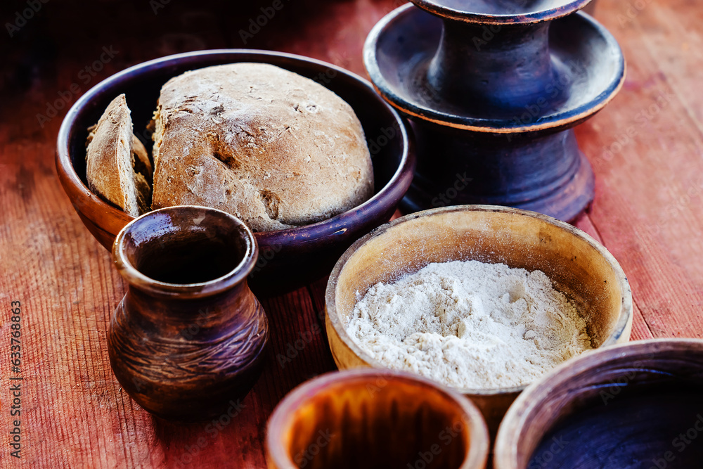 Bread and flour in earthenware. Reconstruction of the life of ancient ...