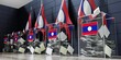 Laos - several ballot boxes and flags - voting, election concept - 3D illustration