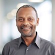 © Lumos sp - business businessman office mature middle aged head shot man portrait corporate manager  black businessperson created using generative ai technology