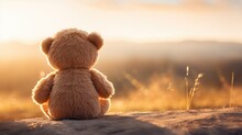 Back View Of Teddy Bear Sitting And Watching Sunset. Generative AI