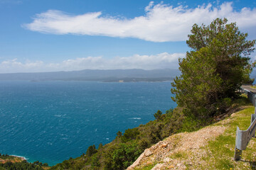 The coast near Bol on the south coast of Brac Island in Croatia in May. Looking towards Hvar Island