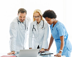 Wall Mural - doctor hospital team medical document health medicine healthcare meeting teamwork laptop computer technology clinic office