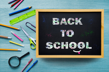 Back to School. Chalk writing on blackboard. The concept of beginning of school year. First day of preschool. Welcome inscription.