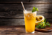 Refreshing Passion Fruit Drink With Mint And Vodka.