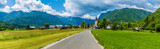 Fototapeta Tęcza - A panorama view towards the alpine village of Stara Fuzina above lake Bohinj in Slovenia in summertime