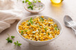 © fahrwasser - Sauteed yellow and white corn with herbs, healthy side dish idea